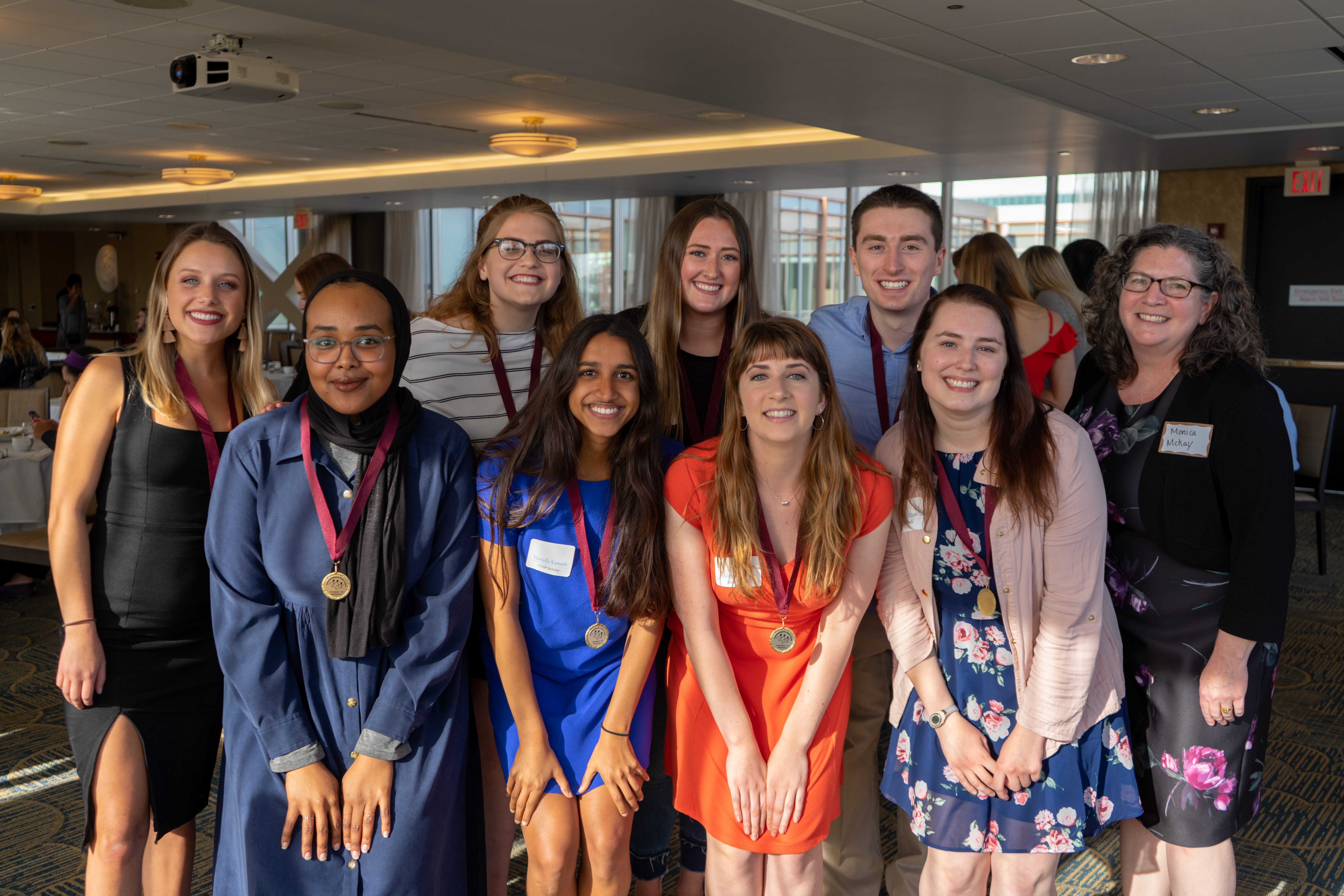 Reception photo of scholars wearing medals